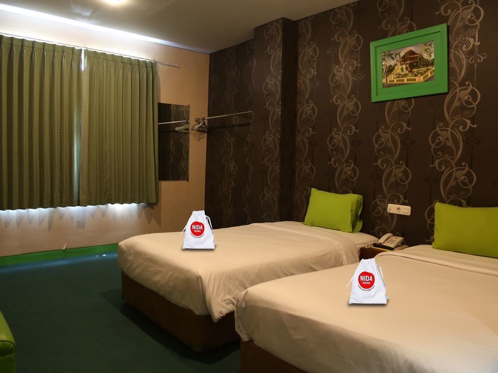Nida Rooms Makassar Jampea 19536 Exteriör bild
